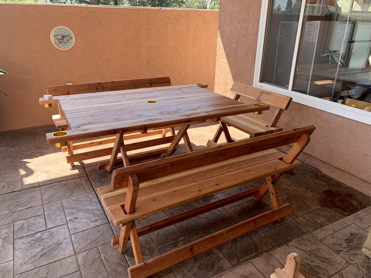 Outdoor Redwood Dining Tables Seat 12 and are easily stored!